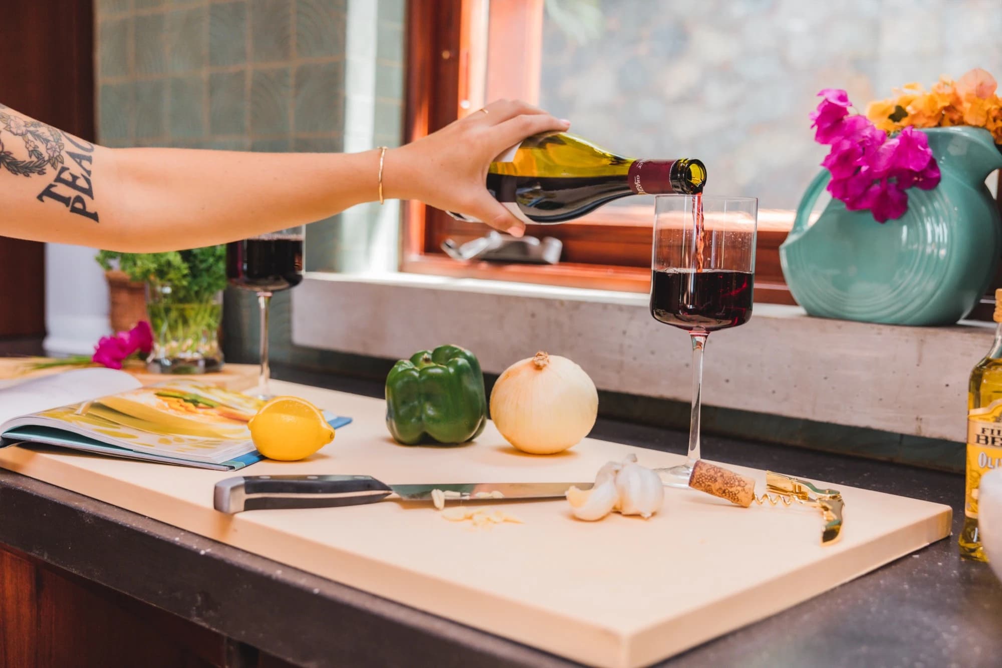 Kitchen counter with wine and cooking prep at Valhalla St John, Catherineberg