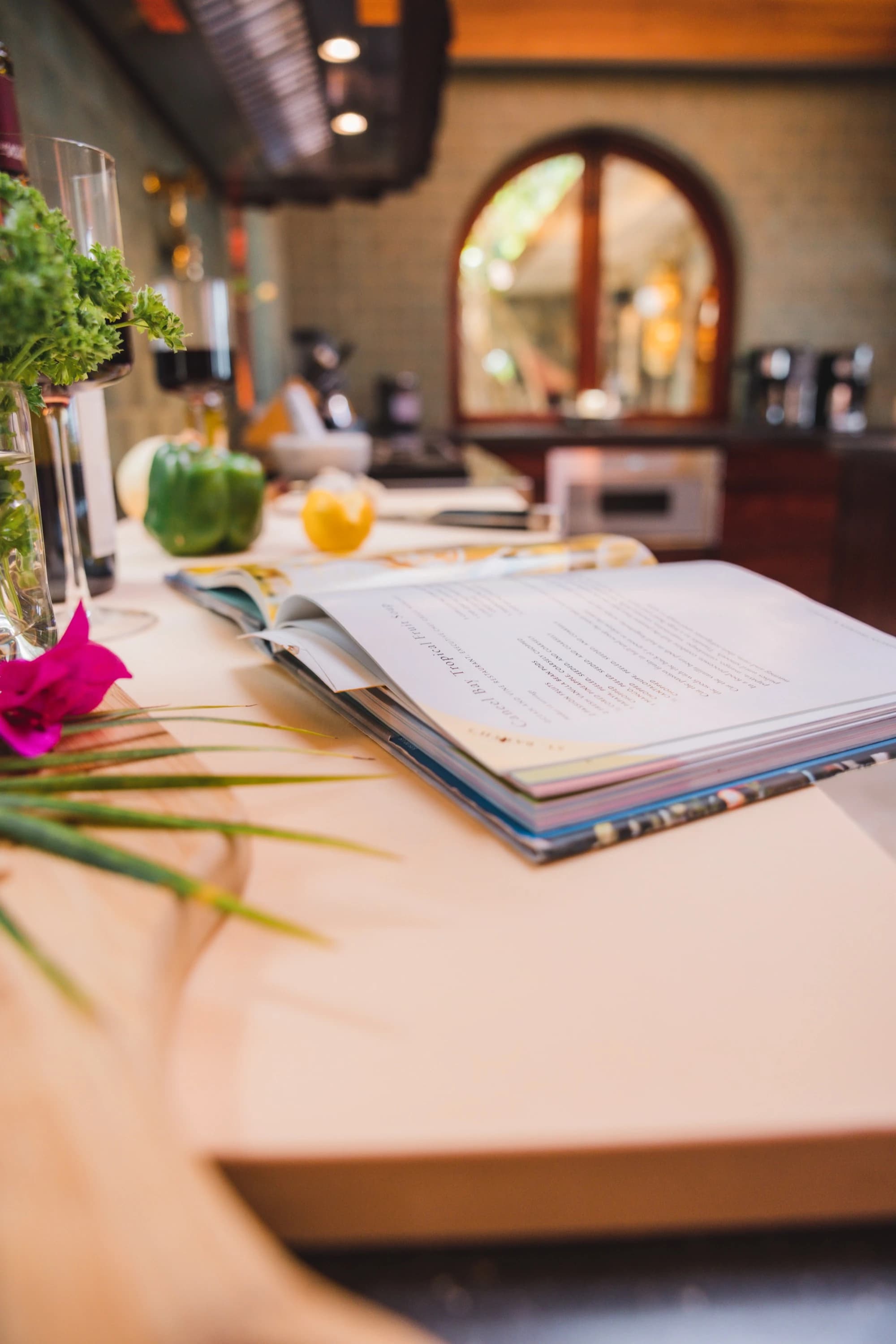 Cookbook and flowers on kitchen counter at Valhalla St John villa